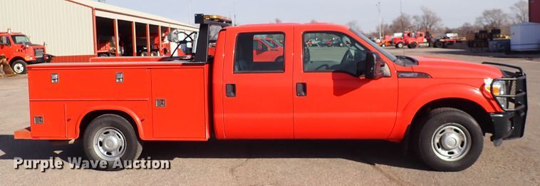 image for item DI1798 2011 Ford F250 Super Duty  Crew Cab utility bed pickup truck
