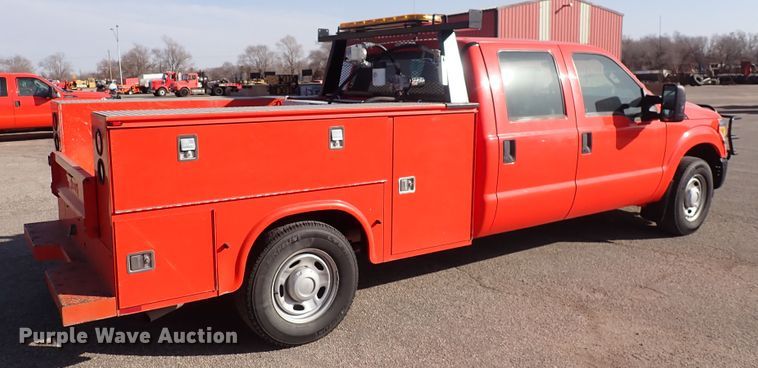 image for item DI1798 2011 Ford F250 Super Duty  Crew Cab utility bed pickup truck