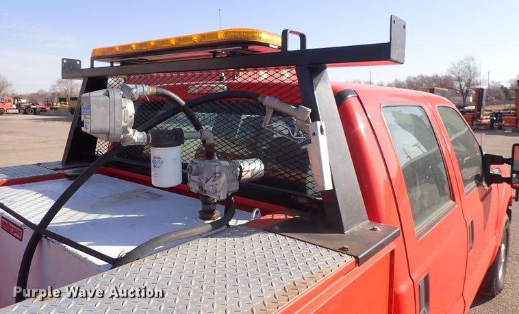 image for item DI1798 2011 Ford F250 Super Duty  Crew Cab utility bed pickup truck