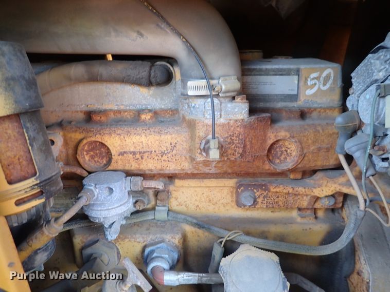 image for item DI1811 1997 John Deere 310E  backhoe