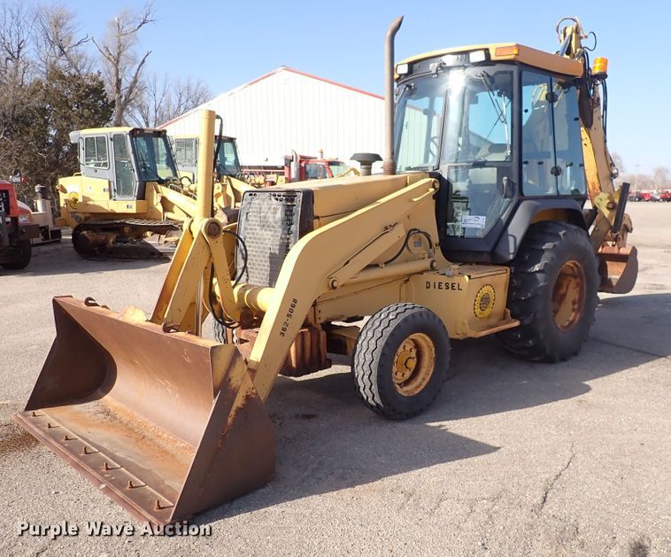 image for item DI1825 1998 John Deere 310E  backhoe