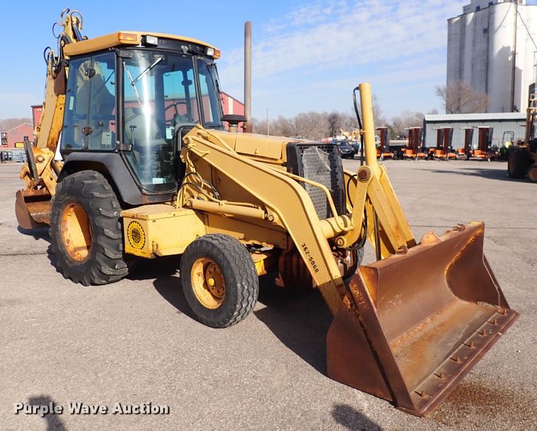 image for item DI1825 1998 John Deere 310E  backhoe
