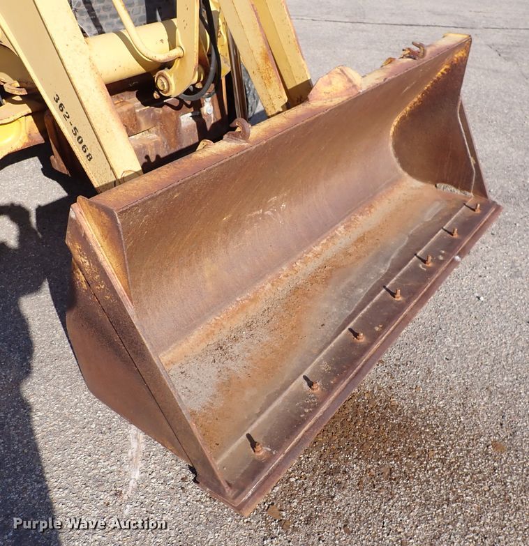 image for item DI1825 1998 John Deere 310E  backhoe