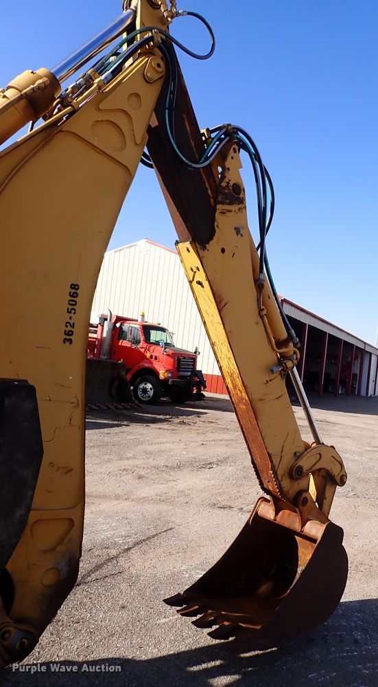 image for item DI1825 1998 John Deere 310E  backhoe