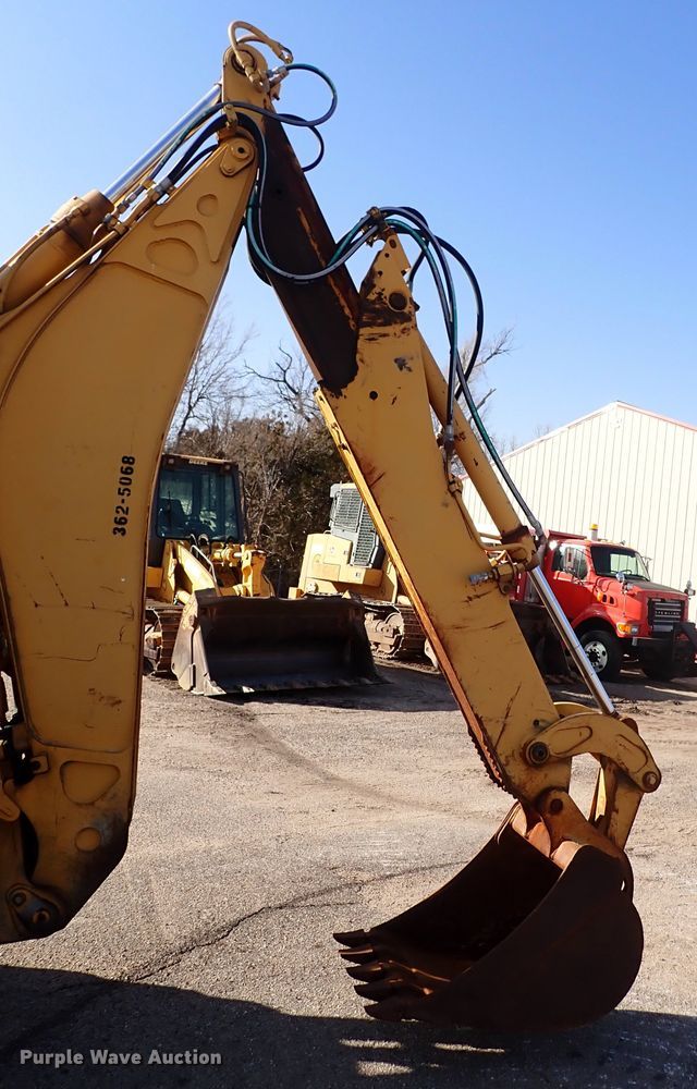 image for item DI1825 1998 John Deere 310E  backhoe