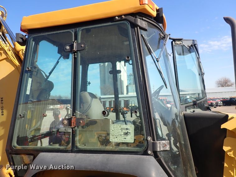 image for item DI1825 1998 John Deere 310E  backhoe