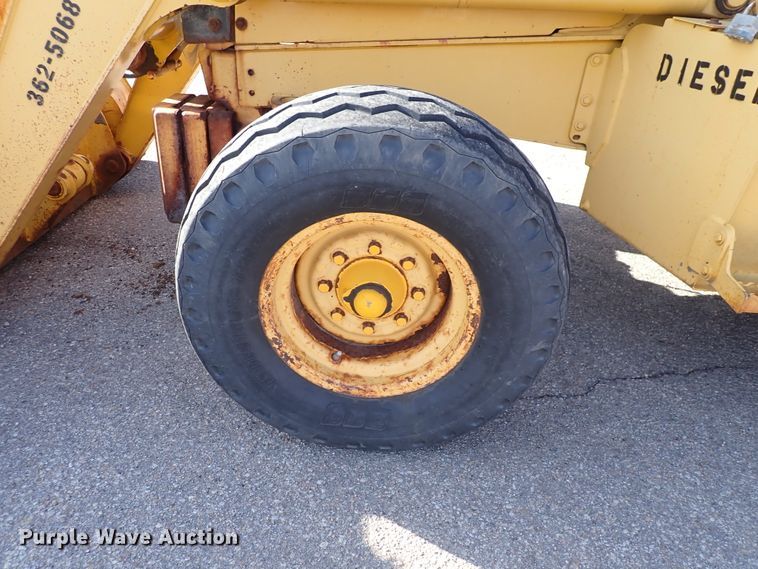 image for item DI1825 1998 John Deere 310E  backhoe