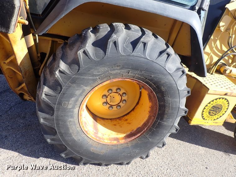 image for item DI1825 1998 John Deere 310E  backhoe