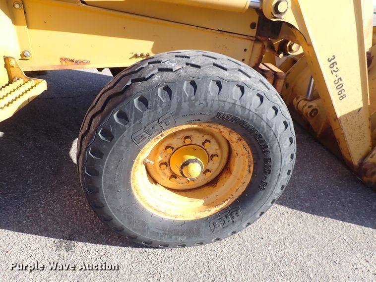 image for item DI1825 1998 John Deere 310E  backhoe