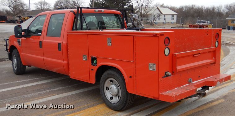 image for item IE9651 2008 Ford F250 Super Duty XL  Crew Cab utility bed pickup truck
