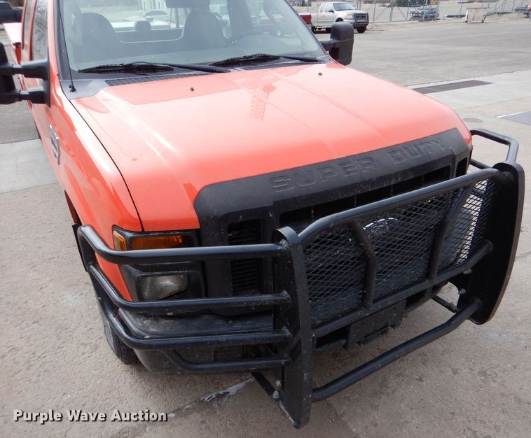 image for item IE9662 2008 Ford F250 Super Duty  Crew Cab utility bed pickup truck