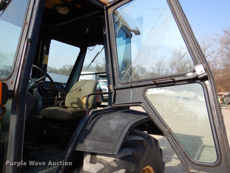 image for item HK9309 1993 Ford 555D  landscape tractor