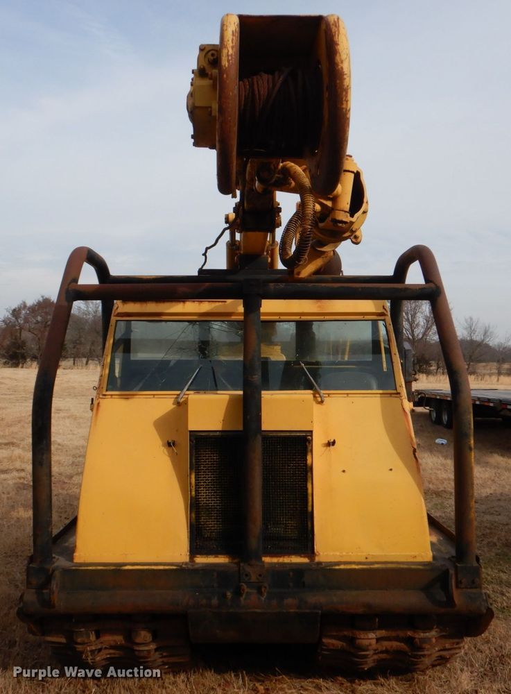 image for item JS9670 Bombardier MC74  track carrier with digger derrick