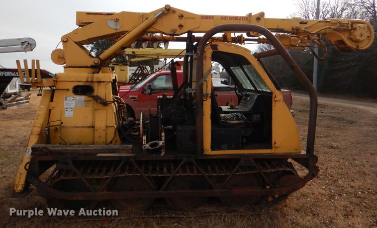 image for item JS9670 Bombardier MC74  track carrier with digger derrick