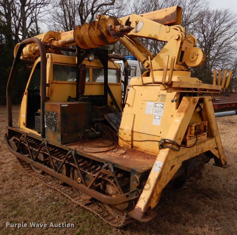 image for item JS9670 Bombardier MC74  track carrier with digger derrick