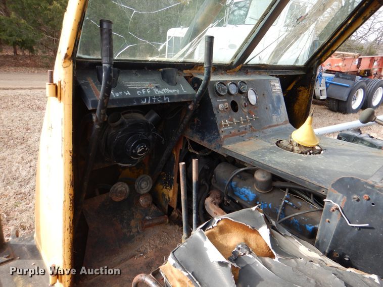 image for item JS9670 Bombardier MC74  track carrier with digger derrick