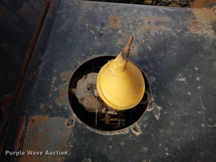 image for item JS9670 Bombardier MC74  track carrier with digger derrick