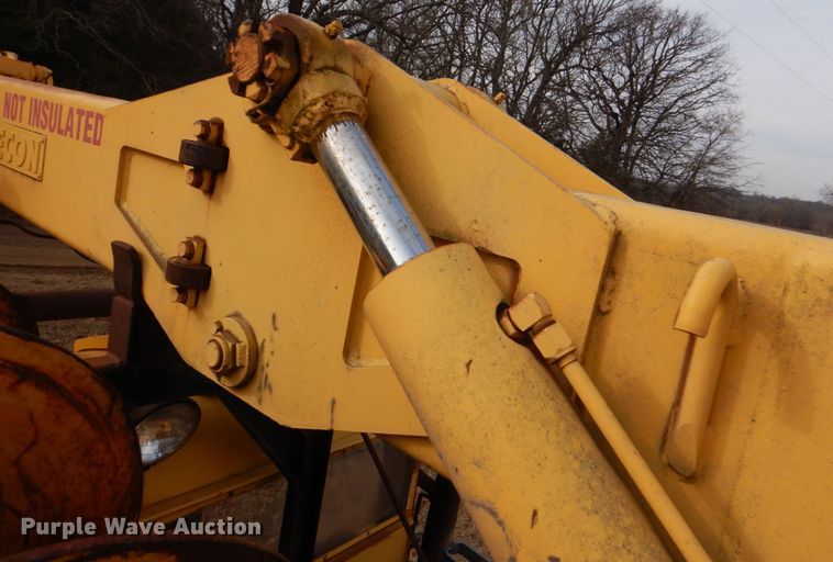 image for item JS9670 Bombardier MC74  track carrier with digger derrick