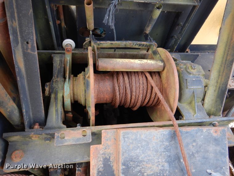 image for item JS9670 Bombardier MC74  track carrier with digger derrick