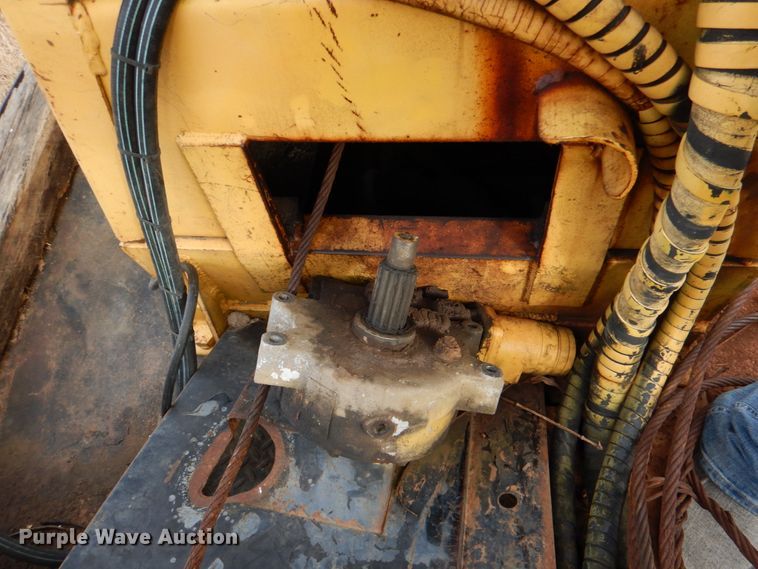 image for item JS9670 Bombardier MC74  track carrier with digger derrick