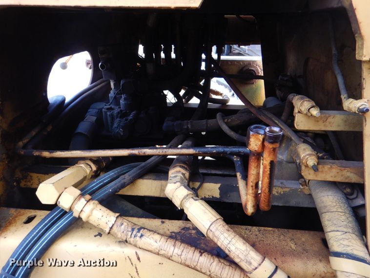 image for item JS9670 Bombardier MC74  track carrier with digger derrick