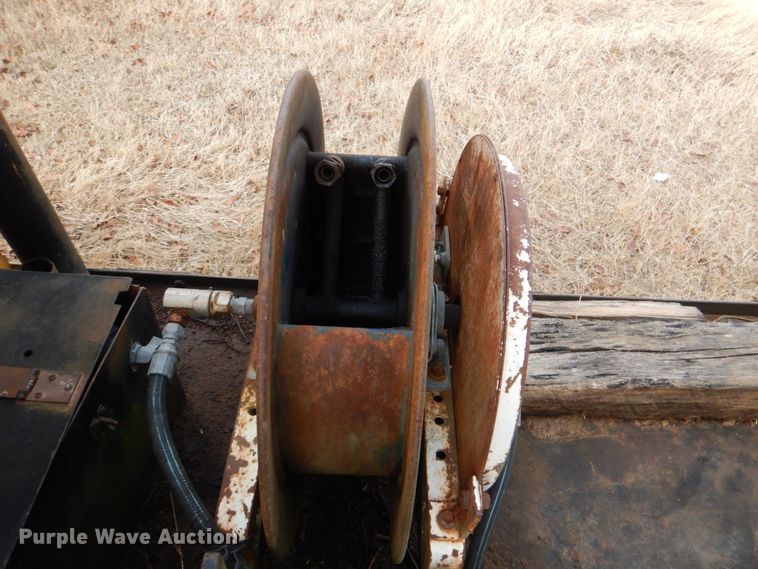 image for item JS9670 Bombardier MC74  track carrier with digger derrick