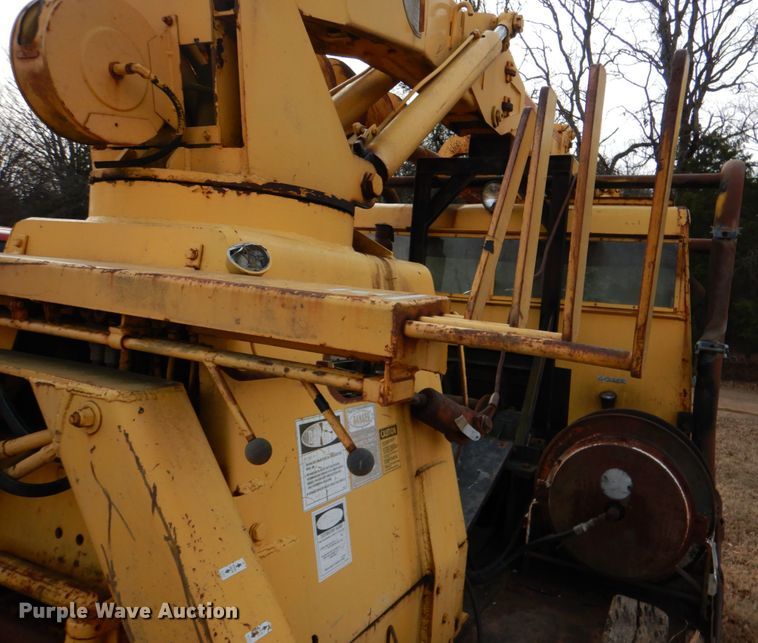 image for item JS9670 Bombardier MC74  track carrier with digger derrick