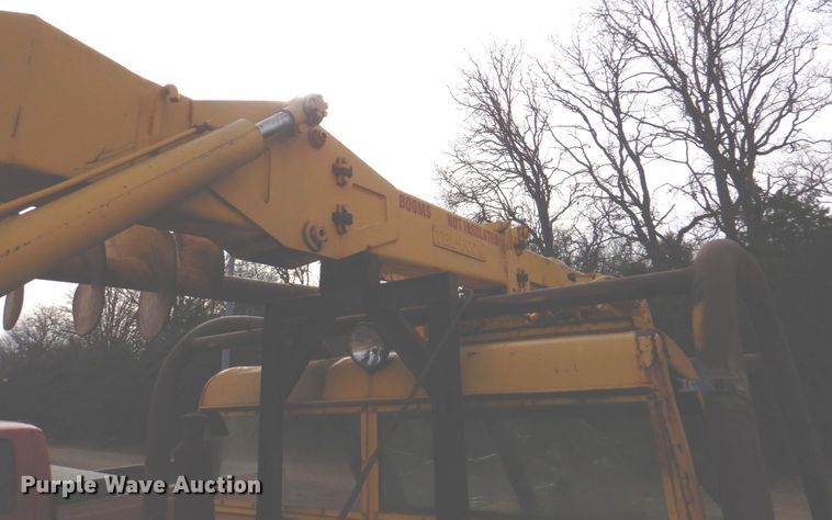 image for item JS9670 Bombardier MC74  track carrier with digger derrick