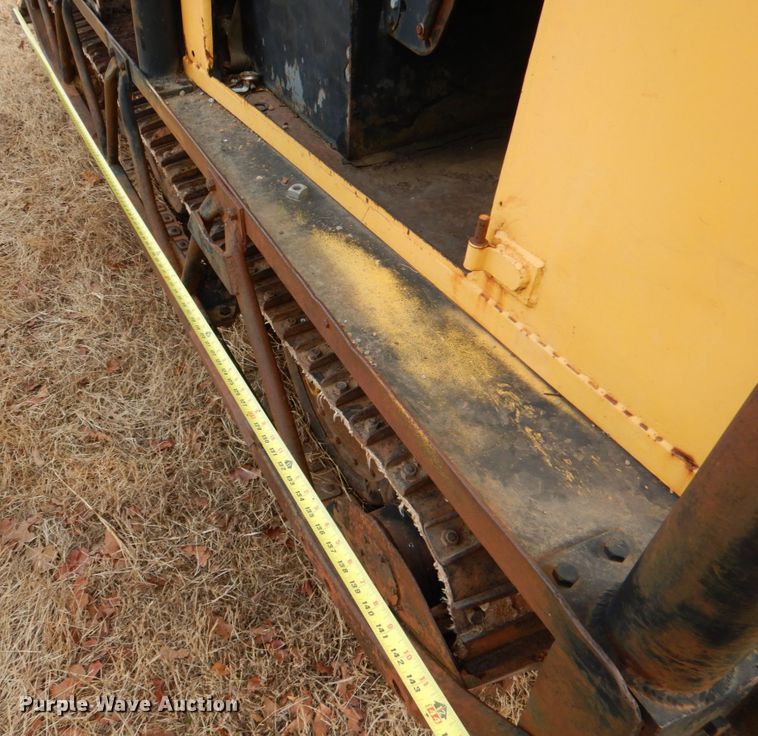 image for item JS9670 Bombardier MC74  track carrier with digger derrick