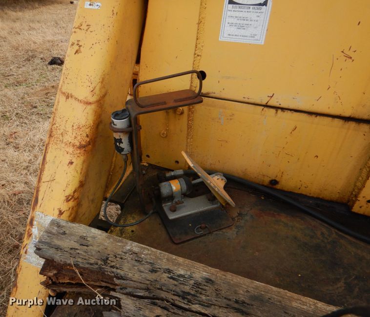 image for item JS9670 Bombardier MC74  track carrier with digger derrick