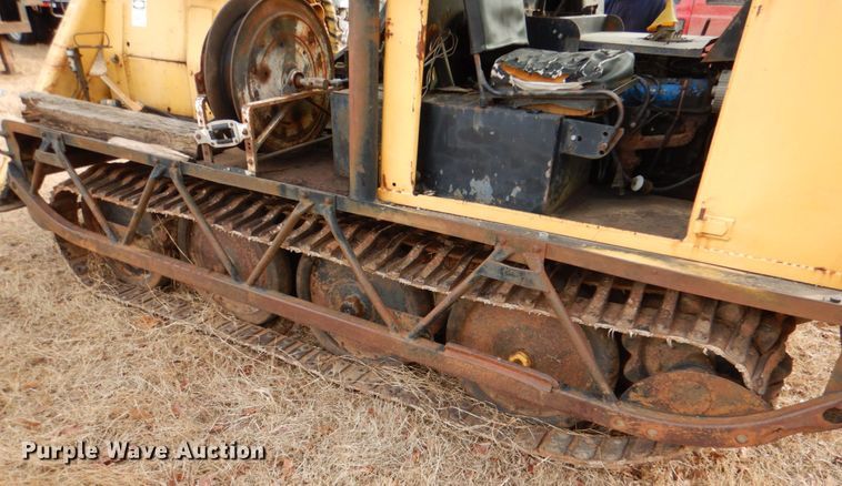 image for item JS9670 Bombardier MC74  track carrier with digger derrick