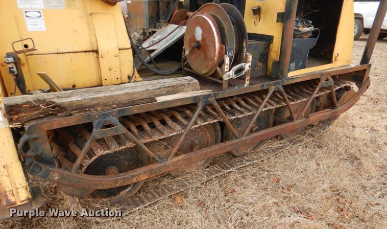 image for item JS9670 Bombardier MC74  track carrier with digger derrick