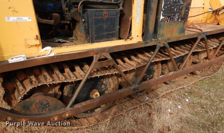 image for item JS9670 Bombardier MC74  track carrier with digger derrick