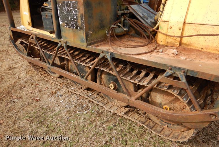 image for item JS9670 Bombardier MC74  track carrier with digger derrick
