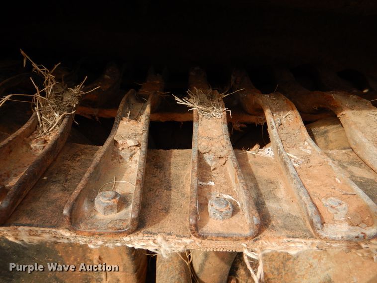 image for item JS9670 Bombardier MC74  track carrier with digger derrick