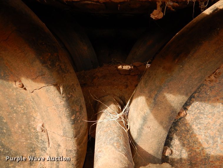 image for item JS9670 Bombardier MC74  track carrier with digger derrick