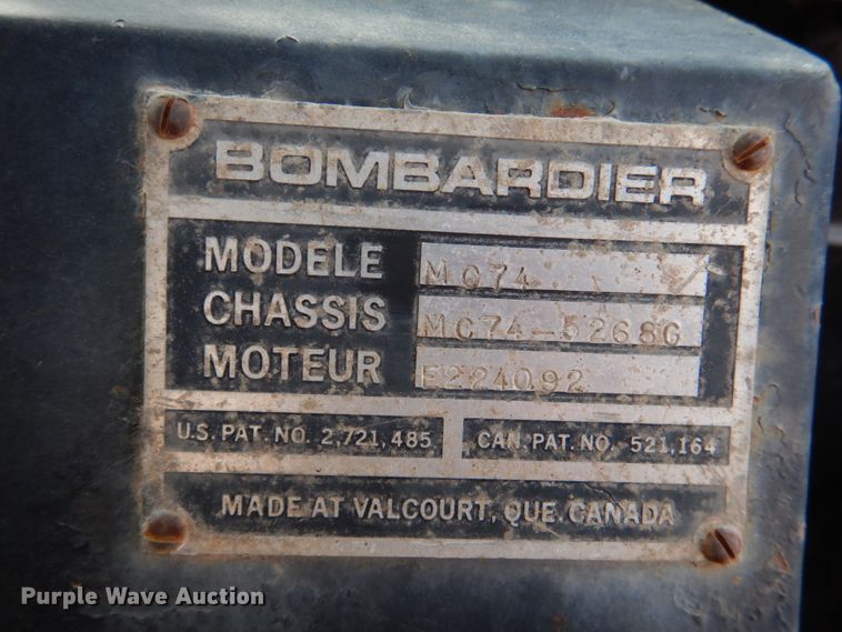 image for item JS9670 Bombardier MC74  track carrier with digger derrick