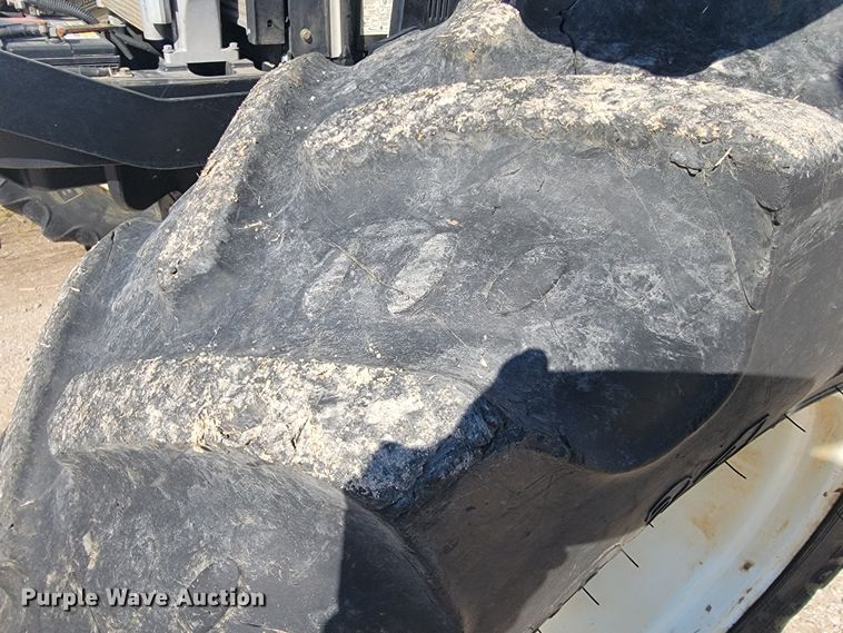 image for item JE9925 New Holland TS6.110  MFWD tractor