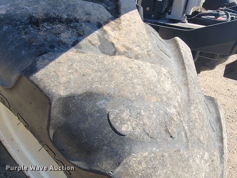 image for item JE9925 New Holland TS6.110  MFWD tractor