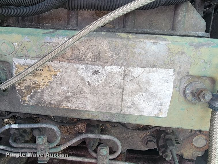 image for item JE9968 2000 Volvo WXLL  refuse truck