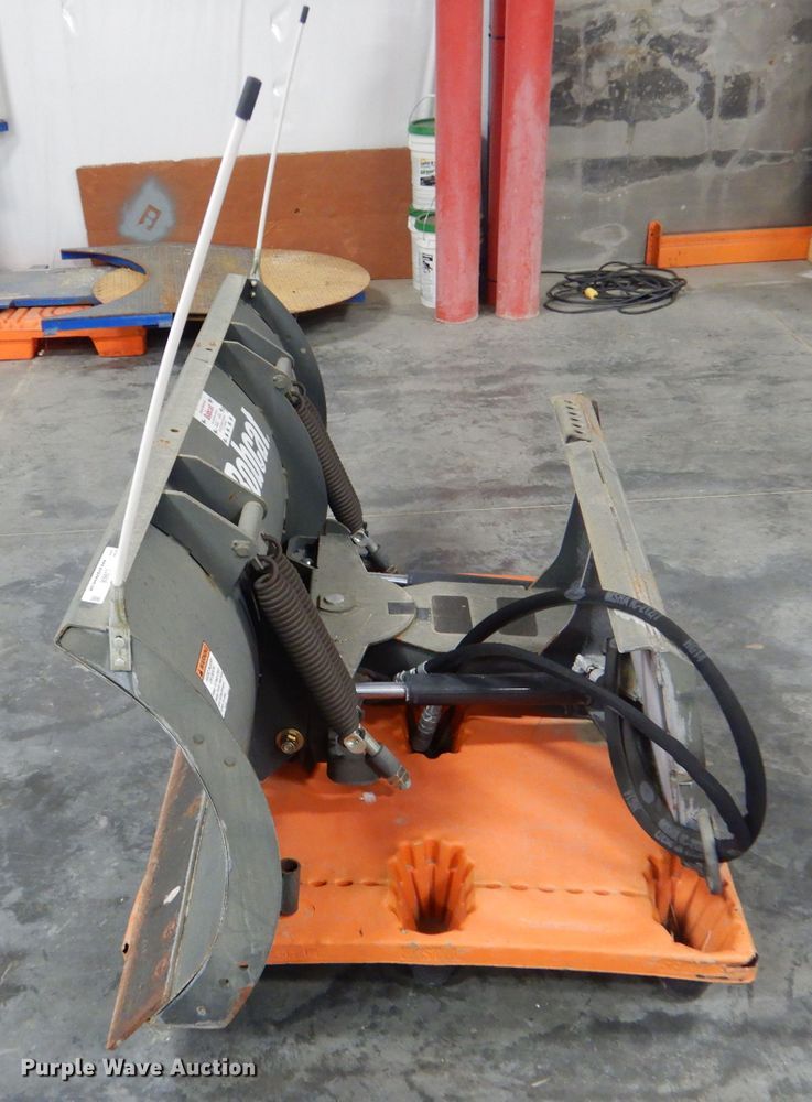 image for item LJ9806 2017 Bobcat 72" W skid steer snow plow