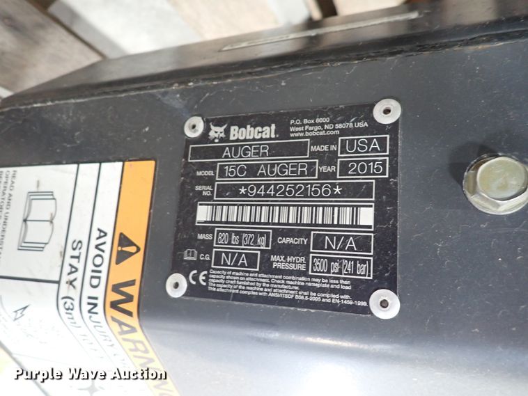 image for item DC4028 2015 Bobcat 15C  skid steer auger