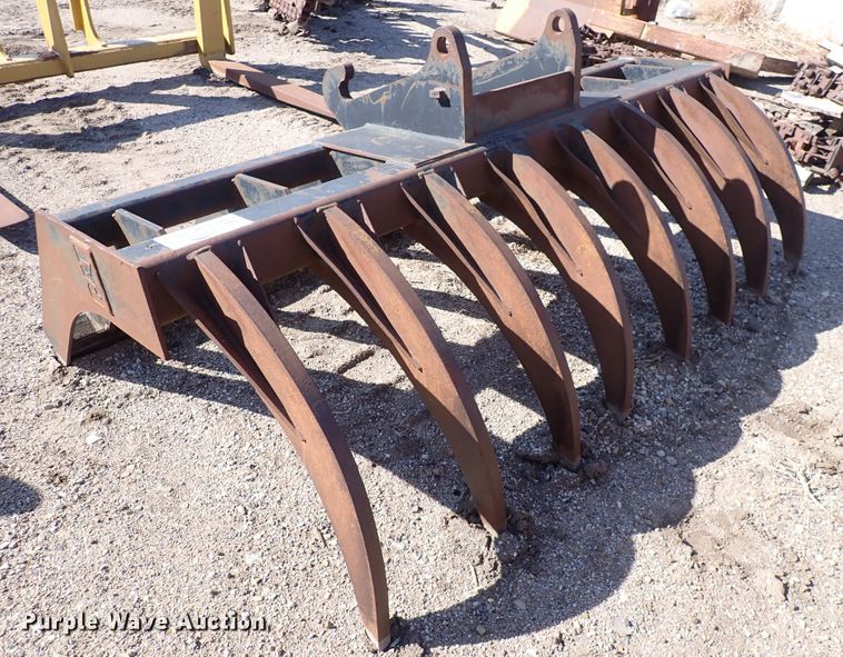 Caterpillar 108" W root rake in Wichita, KS Item DC4052 sold Purple Wave
