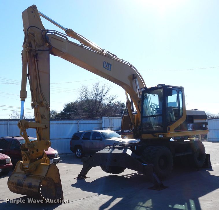 image for item DK0306 1998 Caterpillar M318  wheeled excavator
