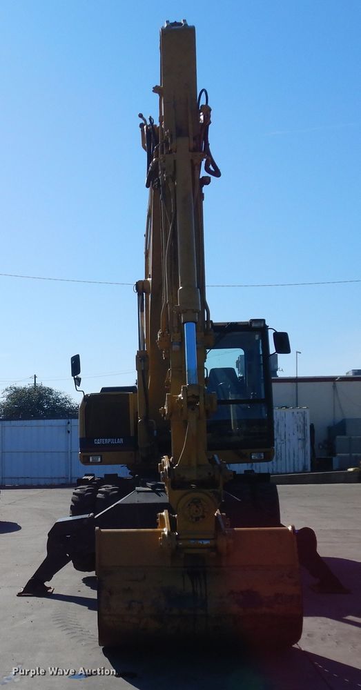 image for item DK0306 1998 Caterpillar M318  wheeled excavator