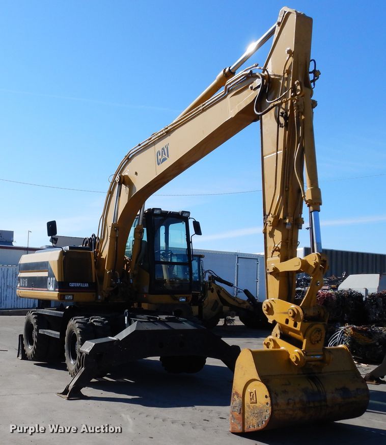 image for item DK0306 1998 Caterpillar M318  wheeled excavator