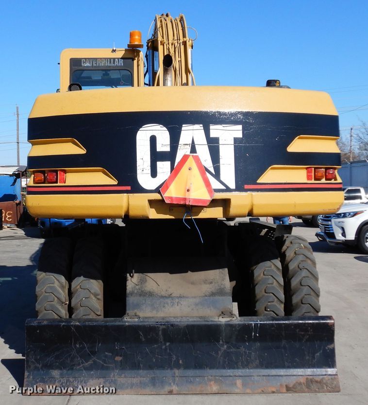 image for item DK0306 1998 Caterpillar M318  wheeled excavator
