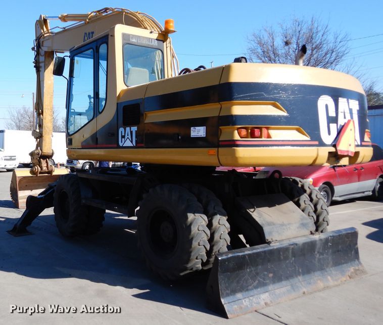image for item DK0306 1998 Caterpillar M318  wheeled excavator