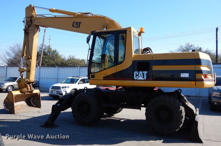 image for item DK0306 1998 Caterpillar M318  wheeled excavator