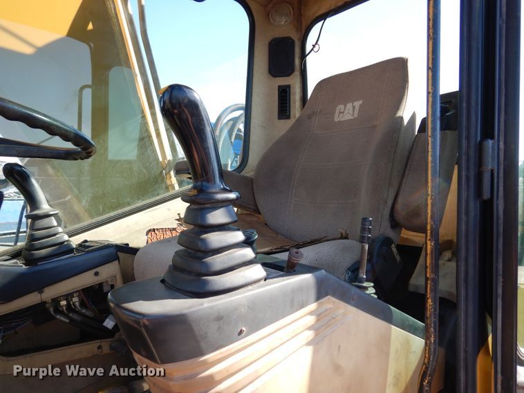 image for item DK0306 1998 Caterpillar M318  wheeled excavator